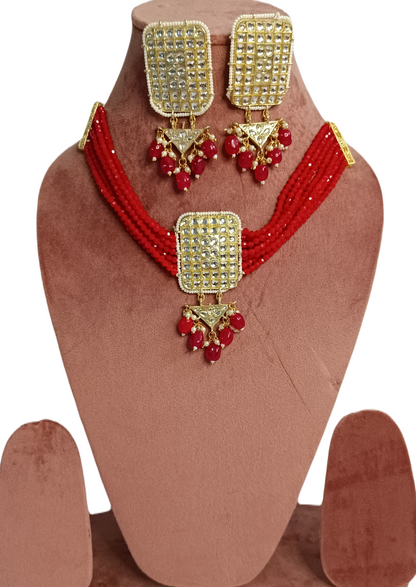 Red choker with Golden Brooch